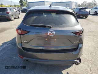 2020 Mazda CX-5 Touring with VIN JM3KFACM9L0815692, listed as a Copart auction lot 52431295 with 59,359 mi miles and Salvage Title. Bid and sale history available at DreamBid. Image 6.