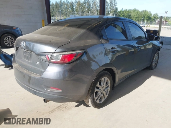 2016 Scion iA z VIN 3MYDLBZV4GY103085, wystawiony jako IAAI lot #42224286 z przebiegiem 90 786 mil mil oraz . Historia ofert i sprzedaży dostępna na DreamBid. Obrazek 4.
