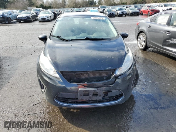 2012 Ford Fiesta SE z VIN 3FADP4EJ4CM183237, wystawiony jako Copart lot #48825605 z przebiegiem 92 798 mil mil oraz Szkoda całkowita • Salvage title. Historia ofert i sprzedaży dostępna na DreamBid. Obrazek 5.
