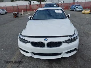 2019 BMW 4 Series 430i with VIN WBA4W3C5XKAF93081, listed as a IAAI auction lot 41689477 with 87,936 mi miles and . Bid and sale history available at DreamBid. Image 13.