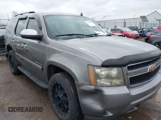 2007 Chevrolet Tahoe LT z VIN 1GNFC13077J278764, wystawiony jako IAAI lot #41927809 z przebiegiem 211 943 mil mil oraz . Historia ofert i sprzedaży dostępna na DreamBid. Obrazek 1.
