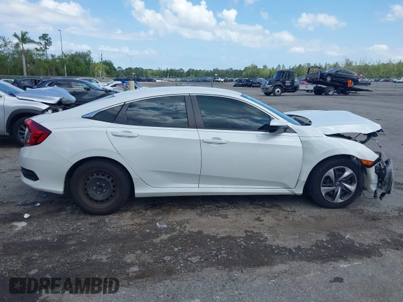2020 Honda Civic LX z VIN 2HGFC2F65LH531818, wystawiony jako IAAI lot #41997104 z przebiegiem 68 878 mil mil oraz . Historia ofert i sprzedaży dostępna na DreamBid. Obrazek 14.