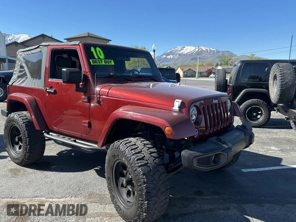 2010 Jeep Wrangler Sahara z VIN 1J4AA5D15AL154750, wystawiony jako Copart lot #55258735 z przebiegiem 157 811 mil mil oraz Czysty tytuł • Clean title. Historia ofert i sprzedaży dostępna na DreamBid. Obrazek 1.