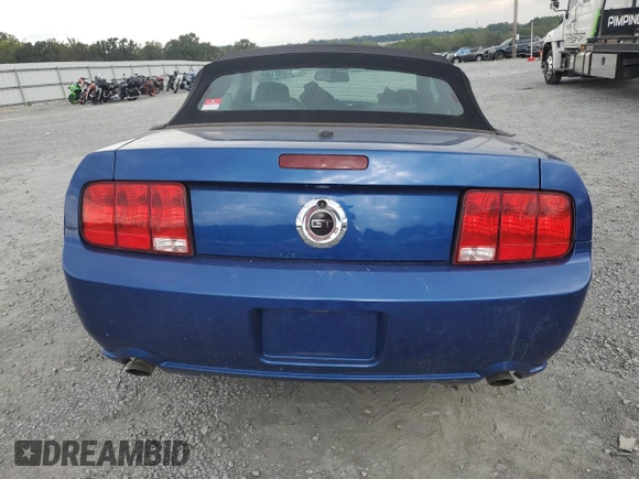 2009 Ford Mustang GT with VIN 1ZVHT85H795103954, listed as a Copart auction lot 73303774 with 28,129 mi miles and Salvage title. Bid and sale history available at DreamBid. Image 6.