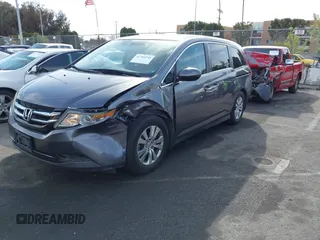 2014 Honda Odyssey EX-L with VIN 5FNRL5H64EB055807, listed as a IAAI auction lot 41760758 with 144,346 mi miles and . Bid and sale history available at carsss.com. Image 17.