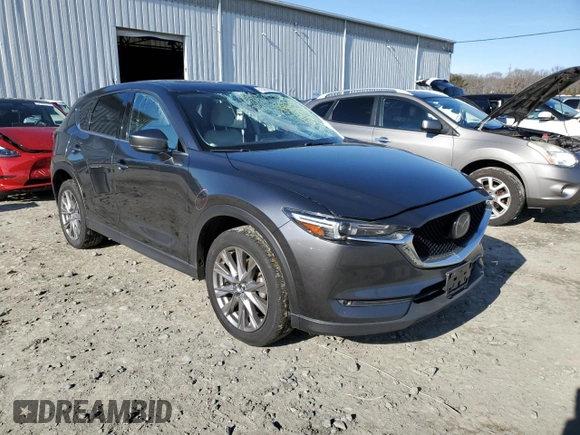 2020 Mazda CX-5 Grand Touring with VIN JM3KFBDM6L0853403, listed as a Copart auction lot 45658645 with 206,323 mi miles and Salvage Title. Bid and sale history available at carsss.com. Image 4.
