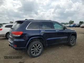 2017 Jeep Grand Cherokee Overland с VIN 1C4RJFCG4HC694654, выставлен на аукционе Copart как лот 60788645 с пробегом 155 642 миль миль и Списание • Salvage title. История ставок и продаж доступна на DreamBid. Изображение 3.