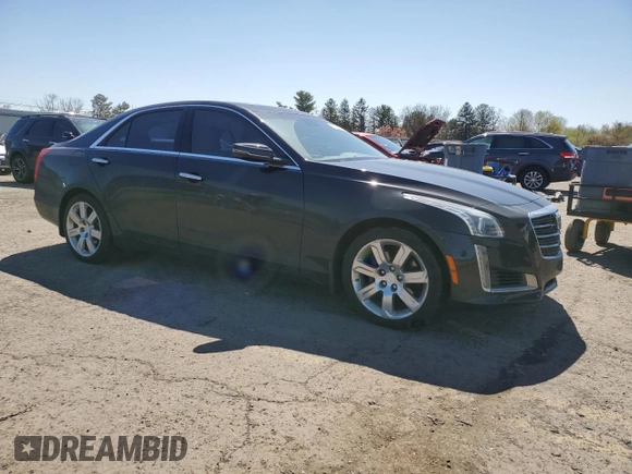 2016 Cadillac CTS Luxury Collection AWD with VIN 1G6AX5SS6G0184823, listed as a Copart auction lot 52234445 with 77,084 mi miles and Clean Title. Bid and sale history available at DreamBid. Image 4.