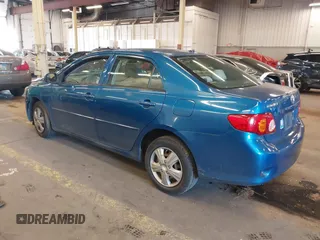 2009 Toyota Corolla with VIN 1NXBU40E19Z027256, listed as a IAAI auction lot 41383298 with 221,545 mi miles. Bid and sale history available at carsss.com. Image 3.