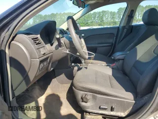 2012 Ford Fusion SE z VIN 3FAHP0HA9CR273430, wystawiony jako Copart lot #62766575 z przebiegiem 212 399 mil mil oraz Szkoda całkowita • Salvage title. Historia ofert i sprzedaży dostępna na DreamBid. Obrazek 7.