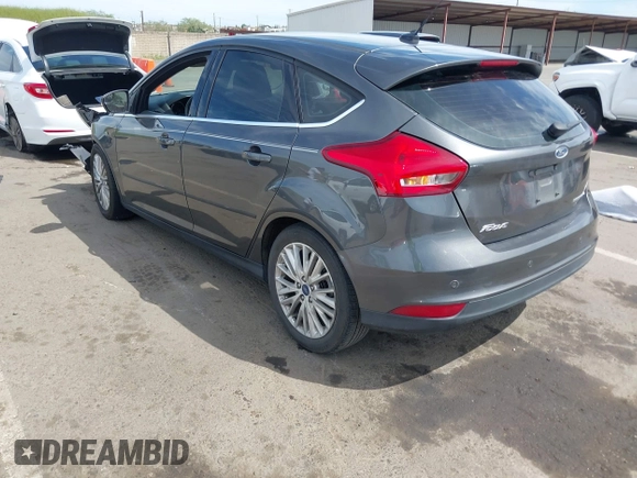 2018 Ford Focus Titanium with VIN 1FADP3N23JL241453, listed as a IAAI auction lot 42025190 with 90,174 mi miles and . Bid and sale history available at DreamBid. Image 3.