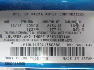 2012 Mazda 3 S Touring with VIN JM1BL1L50C1580880, listed as a IAAI auction lot 41070390 with 94,850 mi miles and . Bid and sale history available at DreamBid. Image 9.