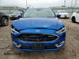2017 Ford Fusion Hybrid Titanium with VIN 3FA6P0RU1HR138725, listed as a Copart auction lot 56650625 with 77,331 mi miles and Salvage title. Bid and sale history available at DreamBid. Image 5.