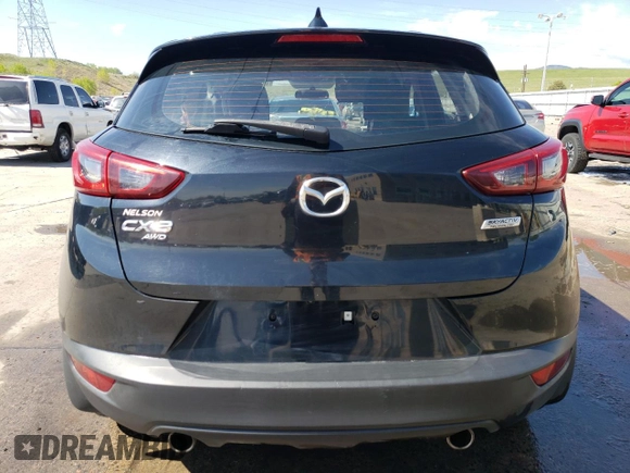 2016 Mazda CX-3 Sport z VIN JM1DKBB72G0106476, wystawiony jako Copart lot #56236245 z przebiegiem 161 207 mil mil oraz Szkody całkowita. Historia ofert i sprzedaży dostępna na DreamBid. Obrazek 6.