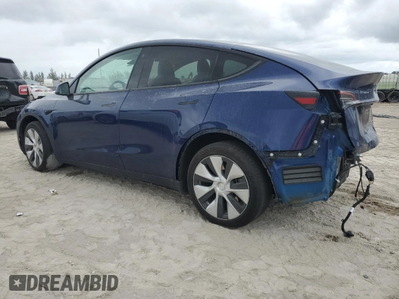 2023 Tesla Model Y Long Range z VIN 7SAYGDEE5PF787794, wystawiony jako Copart lot #55212605 z przebiegiem 30 277 mil mil oraz Szkoda całkowita • Salvage title. Historia ofert i sprzedaży dostępna na DreamBid. Obrazek 2.