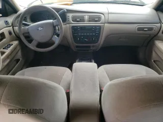2004 Ford Taurus z VIN 1FAFP52214A194125, wystawiony jako Copart lot #43234295 z przebiegiem 216 877 mil mil oraz Szkody całkowita. Historia ofert i sprzedaży dostępna na DreamBid. Obrazek 8.