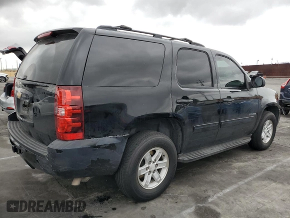 2013 Chevrolet Tahoe LT with VIN 1GNSCBE03DR106164, listed as a Copart auction lot 53738575 with 126,885 mi miles and Salvage title. Bid and sale history available at DreamBid. Image 3.