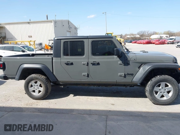 2020 Jeep Gladiator Sport S z VIN 1C6HJTAG7LL154664, wystawiony jako IAAI lot #42033131 z przebiegiem 73 282 mil mil oraz . Historia ofert i sprzedaży dostępna na DreamBid. Obrazek 14.