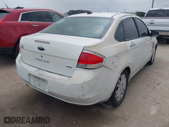 2009 Ford Focus SEL with VIN 1FAHP37N09W181408, listed as a IAAI auction lot 41938580 with 214,183 mi miles. Bid and sale history available at carsss.com. Image 4.