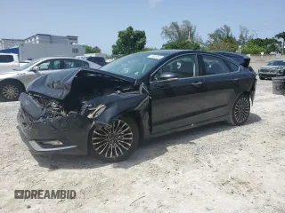 2018 Ford Fusion Titanium с VIN 3FA6P0D98JR124314, выставлен на аукционе Copart как лот 59949595 с пробегом 124 458 миль миль и Списание • Salvage title. История ставок и продаж доступна на DreamBid. Изображение 1.