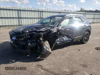 2021 Mazda CX-30 Premium with VIN 3MVDMBDY4MM266060, listed as a Copart auction lot 78896554 with Not Provided miles and Salvage Title. Bid and sale history available at carsss.com. Image 1.