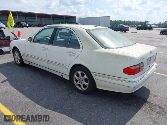 2002 Mercedes-Benz E-Class with VIN WDBJF65J22B432263, listed as a IAAI auction lot 42130545 with 220,852 mi miles. Bid and sale history available at carsss.com. Image 3.