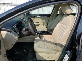 2016 Ford Fusion SE Hybrid with VIN 3FA6P0LU2GR378244, listed as a Copart auction lot 59749135 with 184,469 mi miles and Clean title. Bid and sale history available at DreamBid. Image 7.