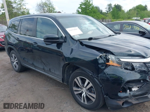 2016 Honda Pilot EX-L with VIN 5FNYF6H53GB070382, listed as a IAAI auction lot 39476567 with 83,741 mi miles and . Bid and sale history available at DreamBid. Image 13.