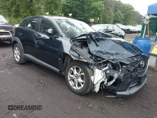 2016 Mazda CX-3 Touring z VIN JM1DKBC79G0118574, wystawiony jako IAAI lot #42357180 z przebiegiem 108 714 mil mil oraz . Historia ofert i sprzedaży dostępna na DreamBid. Obrazek 1.