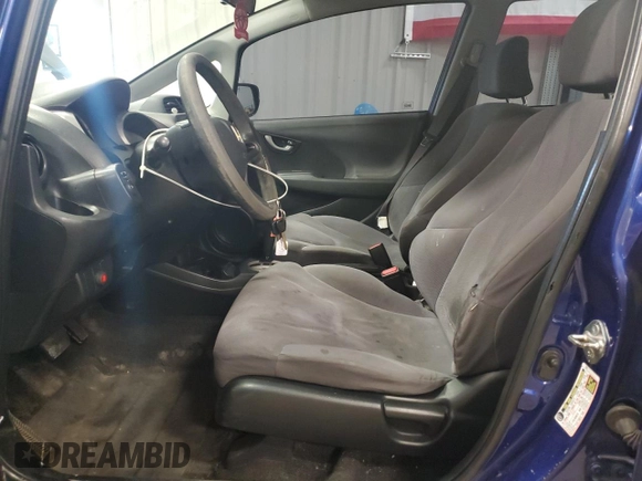 2009 Honda Fit with VIN JHMGE88229S044859, listed as a Copart auction lot 52742495 with 398,726 mi miles and Salvage Title. Bid and sale history available at carsss.com. Image 7.