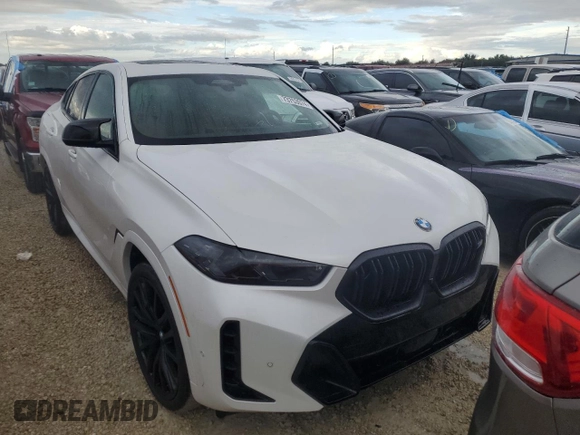 2025 BMW X6 M60i with VIN 5UX43EX07S9X98716, listed as a Copart auction lot 73753074 with 63 mi miles and Salvage Title. Bid and sale history available at carsss.com. Image 5.