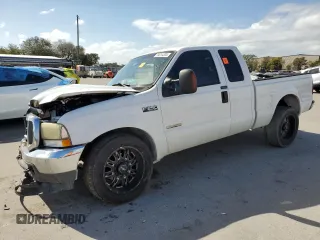 2004 Ford F-250 XL with VIN 1FTNX20PX4EA22882, listed as a Copart auction lot 79014334 with 262,447 mi miles and Salvage title. Bid and sale history available at DreamBid. Image 1.
