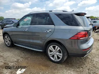 2018 Mercedes-Benz GLE 350 with VIN 4JGDA5HB1JB117315, listed as a Copart auction lot 57871285 with 144,261 mi miles and Salvage title. Bid and sale history available at DreamBid. Image 2.