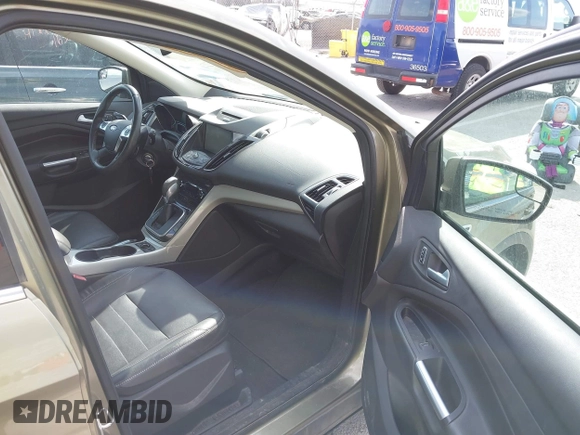 2013 Ford Escape SEL with VIN 1FMCU9H99DUC03956, listed as a IAAI auction lot 41891855 with 84,428 mi miles and . Bid and sale history available at DreamBid. Image 5.
