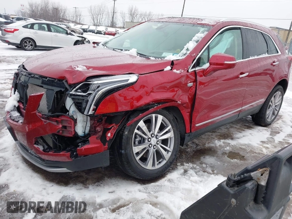 2023 Cadillac XT5 AWD Premium Luxury with VIN 1GYKNDRS6PZ111495, listed as a IAAI auction lot 41185409 with 15,555 mi miles and . Bid and sale history available at DreamBid. Image 2.