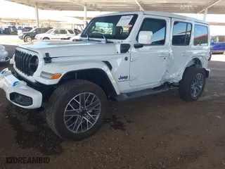 2024 Jeep Wrangler 4xe High Altitude with VIN 1C4RJXU67RW316730, listed as a IAAI auction lot 41322509 with 9,106 mi miles. Bid and sale history available at carsss.com. Image 18.
