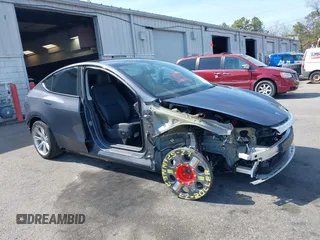 2023 Tesla Model Y Long Range with VIN 7SAYGDEE7PF856985, listed as a IAAI auction lot 42097675 with 13,112 mi miles and . Bid and sale history available at DreamBid. Image 1.