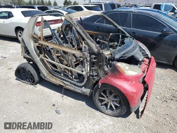 2009 Smart fortwo Passion z VIN WMEEK31X99K211682, wystawiony jako Copart lot #54110385 z przebiegiem Nie podano mil oraz Szkoda całkowita • Salvage title. Historia ofert i sprzedaży dostępna na DreamBid. Obrazek 4.