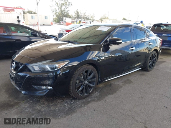 2018 Nissan Maxima SL with VIN 1N4AA6AP4JC371488, listed as a IAAI auction lot 42255682 with 96,696 mi miles and . Bid and sale history available at DreamBid. Image 2.