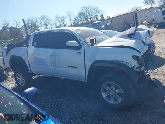 2018 Toyota Tacoma SR with VIN 5TFCZ5AN6JX144056, listed as a IAAI auction lot 41623760 with Not Provided miles and . Bid and sale history available at DreamBid. Image 12.