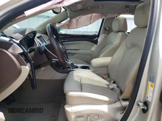 2016 Cadillac SRX Performance Collection with VIN 3GYFNCE32GS508631, listed as a Copart auction lot 60660554 with 92,025 mi miles and Salvage title. Bid and sale history available at DreamBid. Image 7.