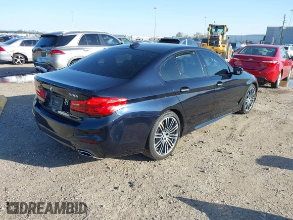2018 BMW 5 Series 530i with VIN WBAJA5C59JWA38170, listed as a IAAI auction lot 41682219 with 61,990 mi miles and . Bid and sale history available at DreamBid. Image 4.