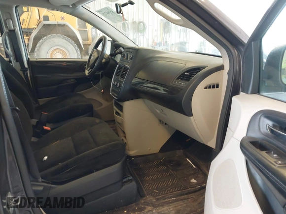 2016 Dodge Grand Caravan SE with VIN 2C4RDGBG1GR117200, listed as a IAAI auction lot 42104773 with 121,007 mi miles and . Bid and sale history available at DreamBid. Image 5.