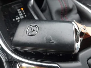 2021 Mazda CX-9 Grand Touring z VIN JM3TCBDY8M0528365, wystawiony jako IAAI lot #42222394 z przebiegiem 44 850 mil mil oraz . Historia ofert i sprzedaży dostępna na DreamBid. Obrazek 11.