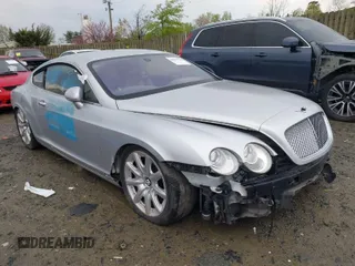 2005 Bentley Continental GT GT z VIN SCBCR63W95C026045, wystawiony jako IAAI lot #42037998 z przebiegiem 14 851 mil mil oraz . Historia ofert i sprzedaży dostępna na DreamBid. Obrazek 1.