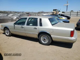 1997 Lincoln Town Car Executive with VIN 1LNLM81W8VY734974, listed as a Copart auction lot 61440195 with 94,982 mi miles and Clean title. Bid and sale history available at DreamBid. Image 2.