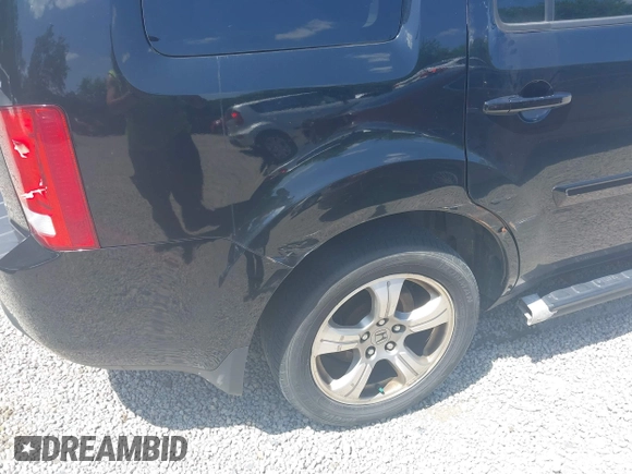2013 Honda Pilot EX-L with VIN 5FNYF4H69DB024242, listed as a IAAI auction lot 42561279 with 205,611 mi miles and . Bid and sale history available at DreamBid. Image 19.