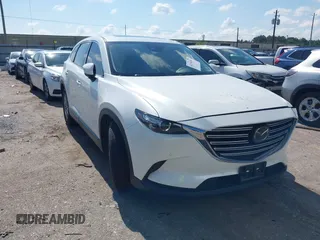 2019 Mazda CX-9 Touring with VIN JM3TCACY7K0314539, listed as a IAAI auction lot 42234361 with 98,299 mi miles and . Bid and sale history available at DreamBid. Image 1.