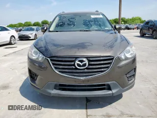 2016 Mazda CX-5 Sport with VIN JM3KE2BY9G0643487, listed as a Copart auction lot 53729265 with 155,875 mi miles and Clean Title. Bid and sale history available at carsss.com. Image 5.