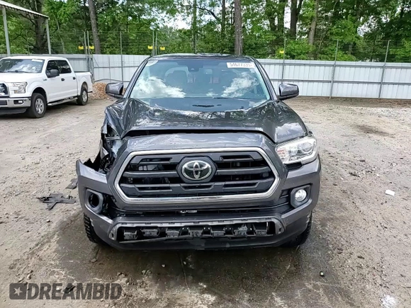 2018 Toyota Tacoma SR5 с VIN 5TFAZ5CN3JX071474, выставлен на аукционе Copart как лот 54677335 с пробегом 86 866 миль миль и Списание • Salvage title. История ставок и продаж доступна на DreamBid. Изображение 13.